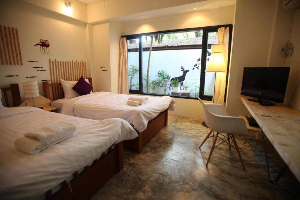 Early Bird Bed & Breakfast (Adults Only) Čiang Mai Pokoj fotografie